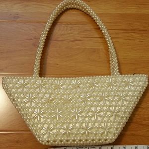 HANDMADE PEARL PURSE.